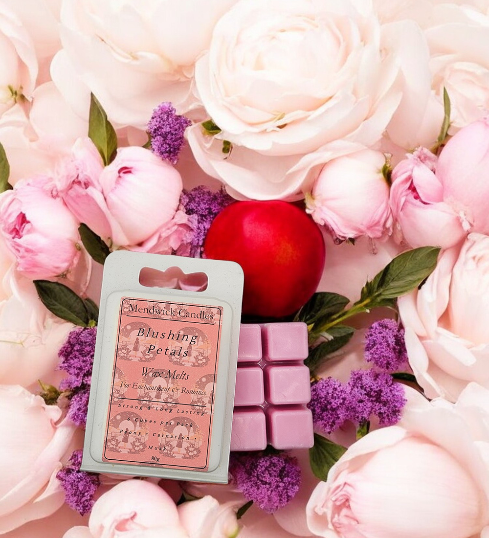 Blushing Petals Wax Melts - SHown lay flat on a range of flowers