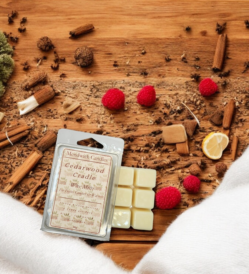 Cedarwood Cradle Wax Melts - shown on a wooden board with a cashmere throw and cedarwood