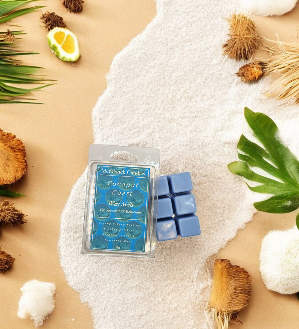 Coconut Coast Wax Melts - Lifestyle shown flat lay with coconut husks, on sand for tropical feeling