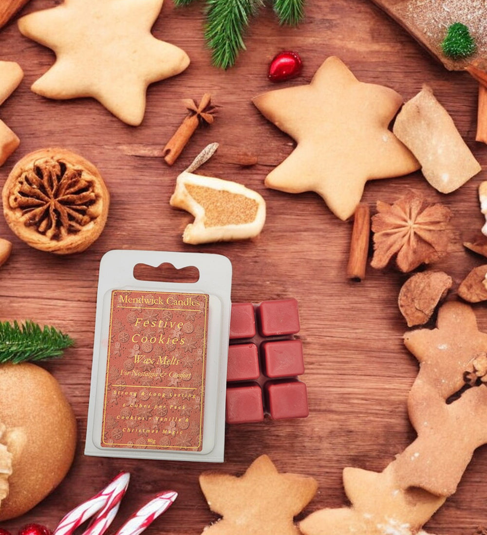 Festive cookies wax melts shown on a wooden board surrounded by Christmas biscuits and spices