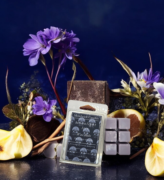 Moonlight Iris Wax Melts, shown on a dark background with purple flowers and pears