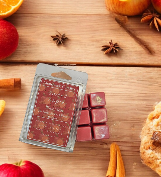 Spiced Apple Wax Melts - shown on a wooden board surrounded by spices and apples