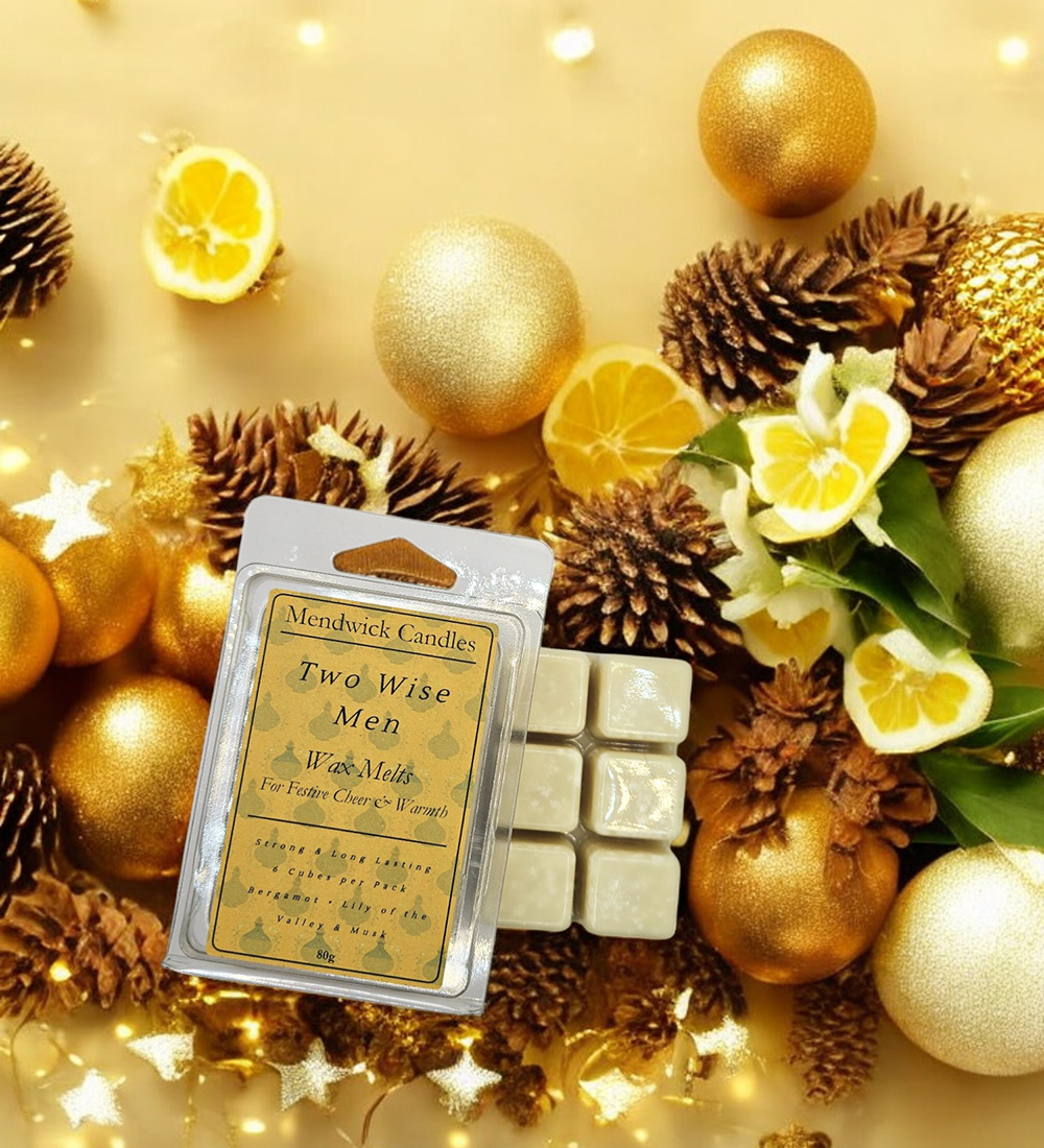 Two Wise Men Wax Melts - shown on a yellow background with baubles and acorns.