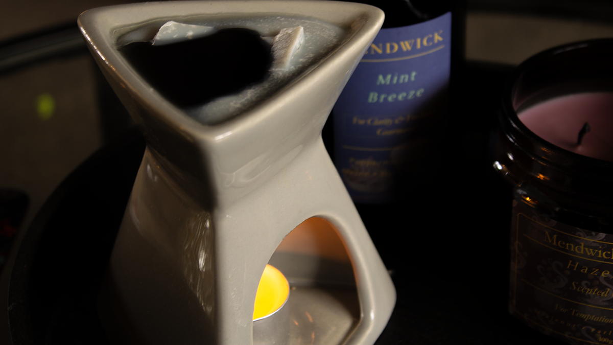 Close up of a grey wax warmer